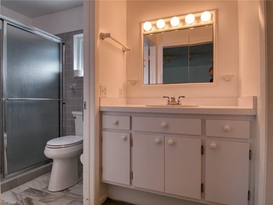 Welcome to Your Private Bonita Retreat! This charming 3-bedroom on Bonita Fairways in Florida - for sale on GolfHomes.com, golf home, golf lot