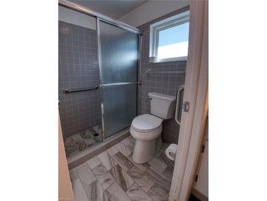 Welcome to Your Private Bonita Retreat! This charming 3-bedroom on Bonita Fairways in Florida - for sale on GolfHomes.com, golf home, golf lot