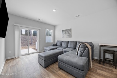 Elegantly appointed resale townhome located in The Hamptons at on Brunswick Plantation and Golf Resorts in North Carolina - for sale on GolfHomes.com, golf home, golf lot