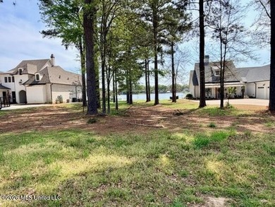 Prime waterfront lot in Lake Caroline ready for you to build on Lake Caroline Golf Club in Mississippi - for sale on GolfHomes.com, golf home, golf lot