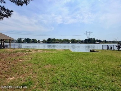 Prime waterfront lot in Lake Caroline ready for you to build on Lake Caroline Golf Club in Mississippi - for sale on GolfHomes.com, golf home, golf lot