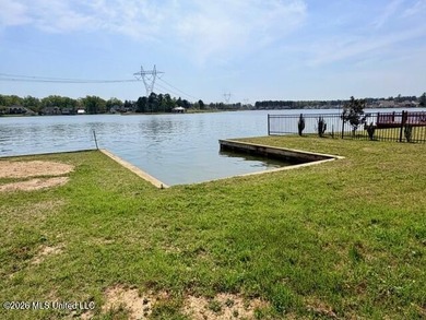 Prime waterfront lot in Lake Caroline ready for you to build on Lake Caroline Golf Club in Mississippi - for sale on GolfHomes.com, golf home, golf lot