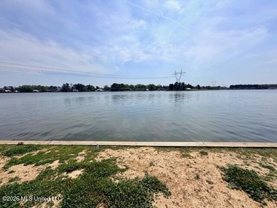 Prime waterfront lot in Lake Caroline ready for you to build on Lake Caroline Golf Club in Mississippi - for sale on GolfHomes.com, golf home, golf lot