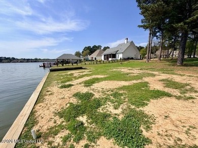 Prime waterfront lot in Lake Caroline ready for you to build on Lake Caroline Golf Club in Mississippi - for sale on GolfHomes.com, golf home, golf lot