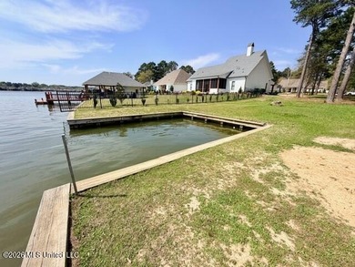 Prime waterfront lot in Lake Caroline ready for you to build on Lake Caroline Golf Club in Mississippi - for sale on GolfHomes.com, golf home, golf lot