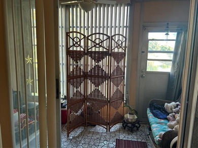 Spacious 2-bedroom, 2-bath first-floor condo in Sunrise Lakes on Sunrise Lakes Phase III in Florida - for sale on GolfHomes.com, golf home, golf lot