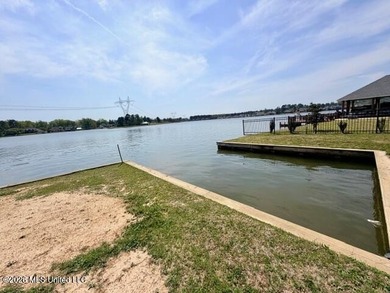 Prime waterfront lot in Lake Caroline ready for you to build on Lake Caroline Golf Club in Mississippi - for sale on GolfHomes.com, golf home, golf lot