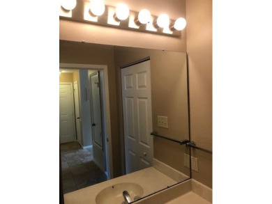 This unit is on the bottom floor, with the back door opening on Rockport Country Club in Texas - for sale on GolfHomes.com, golf home, golf lot
