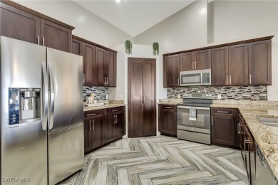 Step into this beautifully reimagined Cape Coral residence where on Palmetto-Pine Country Club in Florida - for sale on GolfHomes.com, golf home, golf lot