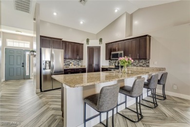 Step into this beautifully reimagined Cape Coral residence where on Palmetto-Pine Country Club in Florida - for sale on GolfHomes.com, golf home, golf lot