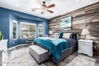 Situated on a fully enclosed corner lot, this beautifully on Poston Butte Golf Club in Arizona - for sale on GolfHomes.com, golf home, golf lot