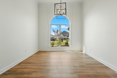 This traditional home located on a quiet street in the Country on The Country Club of Arkansas in Arkansas - for sale on GolfHomes.com, golf home, golf lot