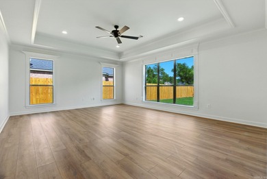 This traditional home located on a quiet street in the Country on The Country Club of Arkansas in Arkansas - for sale on GolfHomes.com, golf home, golf lot