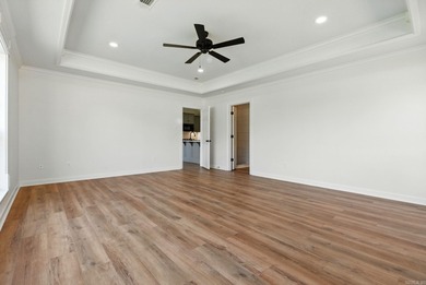 This traditional home located on a quiet street in the Country on The Country Club of Arkansas in Arkansas - for sale on GolfHomes.com, golf home, golf lot