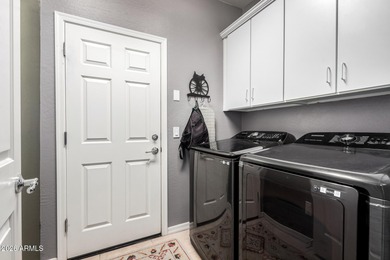 Situated on a fully enclosed corner lot, this beautifully on Poston Butte Golf Club in Arizona - for sale on GolfHomes.com, golf home, golf lot