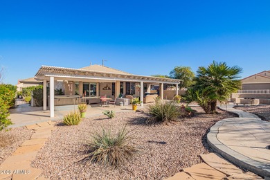 Situated on a fully enclosed corner lot, this beautifully on Poston Butte Golf Club in Arizona - for sale on GolfHomes.com, golf home, golf lot
