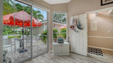 This move-in ready, updated, and impeccably maintained 2-bedroom on University Park Country Club in Florida - for sale on GolfHomes.com, golf home, golf lot