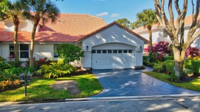 This retreat in the village of Cedar Cay blends its on Broken Sound Golf and Club  in Florida - for sale on GolfHomes.com, golf home, golf lot