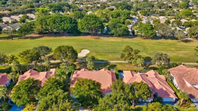 This retreat in the village of Cedar Cay blends its on Broken Sound Golf and Club  in Florida - for sale on GolfHomes.com, golf home, golf lot