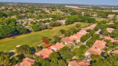 This retreat in the village of Cedar Cay blends its on Broken Sound Golf and Club  in Florida - for sale on GolfHomes.com, golf home, golf lot