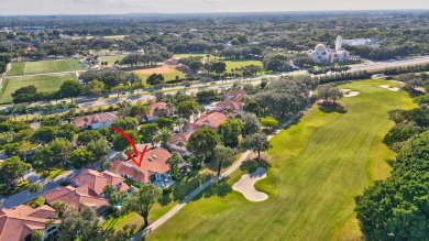 This retreat in the village of Cedar Cay blends its on Broken Sound Golf and Club  in Florida - for sale on GolfHomes.com, golf home, golf lot