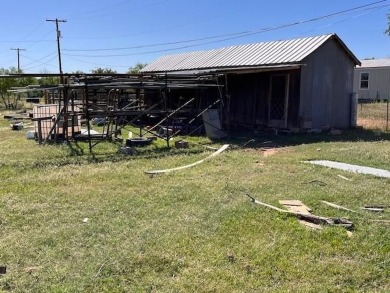 An entire half block is included with this home, perfect for on Rotan Golf Club in Texas - for sale on GolfHomes.com, golf home, golf lot