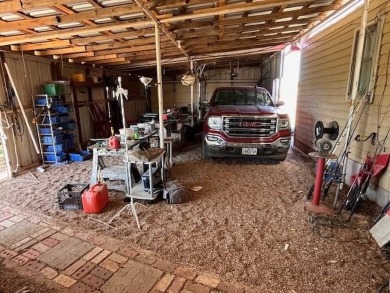 An entire half block is included with this home, perfect for on Rotan Golf Club in Texas - for sale on GolfHomes.com, golf home, golf lot