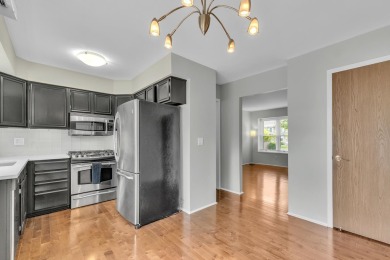 Beautifully updated townhome w/ Canadian maple hardwood floors on Georgetown Country Club in Michigan - for sale on GolfHomes.com, golf home, golf lot