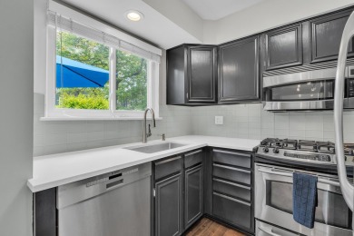 Beautifully updated townhome w/ Canadian maple hardwood floors on Georgetown Country Club in Michigan - for sale on GolfHomes.com, golf home, golf lot