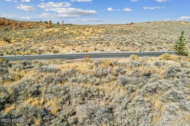 An exceptional homesite overlooking the lake and first hole of on Promontory Nicklaus Painted Valley Golf Course in Utah - for sale on GolfHomes.com, golf home, golf lot