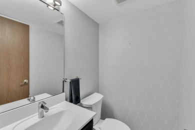 Beautifully updated townhome w/ Canadian maple hardwood floors on Georgetown Country Club in Michigan - for sale on GolfHomes.com, golf home, golf lot