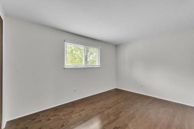 Beautifully updated townhome w/ Canadian maple hardwood floors on Georgetown Country Club in Michigan - for sale on GolfHomes.com, golf home, golf lot