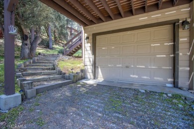 Nestled in the charming community of Pine Mountain Club, this on Pine Mountain Club in California - for sale on GolfHomes.com, golf home, golf lot