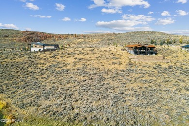 An exceptional homesite overlooking the lake and first hole of on Promontory Nicklaus Painted Valley Golf Course in Utah - for sale on GolfHomes.com, golf home, golf lot