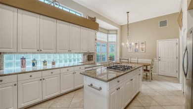 Welcome to this beautifully maintained and tastefully updated on University Park Country Club in Florida - for sale on GolfHomes.com, golf home, golf lot