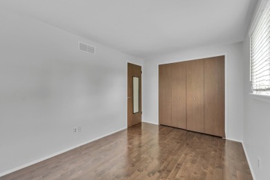 Beautifully updated townhome w/ Canadian maple hardwood floors on Georgetown Country Club in Michigan - for sale on GolfHomes.com, golf home, golf lot