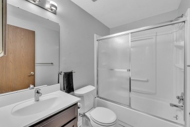 Beautifully updated townhome w/ Canadian maple hardwood floors on Georgetown Country Club in Michigan - for sale on GolfHomes.com, golf home, golf lot