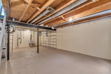 Beautifully updated townhome w/ Canadian maple hardwood floors on Georgetown Country Club in Michigan - for sale on GolfHomes.com, golf home, golf lot