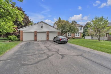 Beautifully updated townhome w/ Canadian maple hardwood floors on Georgetown Country Club in Michigan - for sale on GolfHomes.com, golf home, golf lot