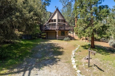 Nestled in the charming community of Pine Mountain Club, this on Pine Mountain Club in California - for sale on GolfHomes.com, golf home, golf lot