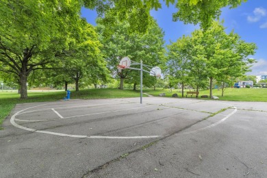 Beautifully updated townhome w/ Canadian maple hardwood floors on Georgetown Country Club in Michigan - for sale on GolfHomes.com, golf home, golf lot
