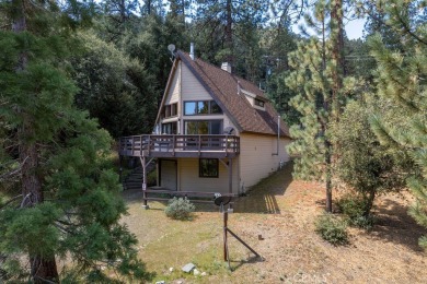 Nestled in the charming community of Pine Mountain Club, this on Pine Mountain Club in California - for sale on GolfHomes.com, golf home, golf lot