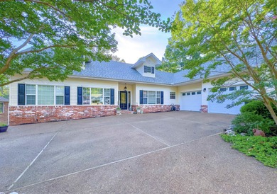 Welcome to 117 Cifuentes Way, a charming 3BR, 4BA custom home on Ponce De Leon Golf Course in Arkansas - for sale on GolfHomes.com, golf home, golf lot