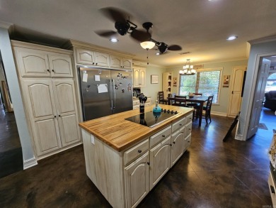 This stunning home truly has it all! Featuring 4 spacious on Foxwood Golf Club in Arkansas - for sale on GolfHomes.com, golf home, golf lot