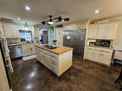 This stunning home truly has it all! Featuring 4 spacious on Foxwood Golf Club in Arkansas - for sale on GolfHomes.com, golf home, golf lot