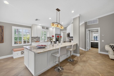RARE OPPORTUNITY to own a beautifully updated DiVosta Capri on The Golf Club of Jupiter in Florida - for sale on GolfHomes.com, golf home, golf lot
