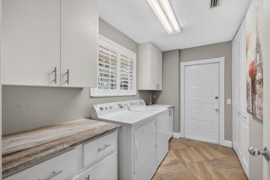 RARE OPPORTUNITY to own a beautifully updated DiVosta Capri on The Golf Club of Jupiter in Florida - for sale on GolfHomes.com, golf home, golf lot