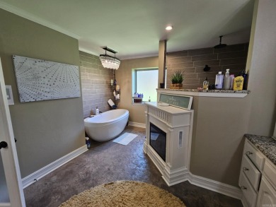 This stunning home truly has it all! Featuring 4 spacious on Foxwood Golf Club in Arkansas - for sale on GolfHomes.com, golf home, golf lot