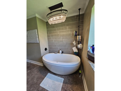 This stunning home truly has it all! Featuring 4 spacious on Foxwood Golf Club in Arkansas - for sale on GolfHomes.com, golf home, golf lot