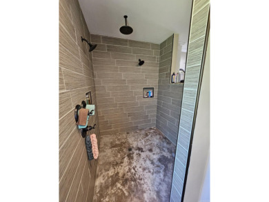 This stunning home truly has it all! Featuring 4 spacious on Foxwood Golf Club in Arkansas - for sale on GolfHomes.com, golf home, golf lot